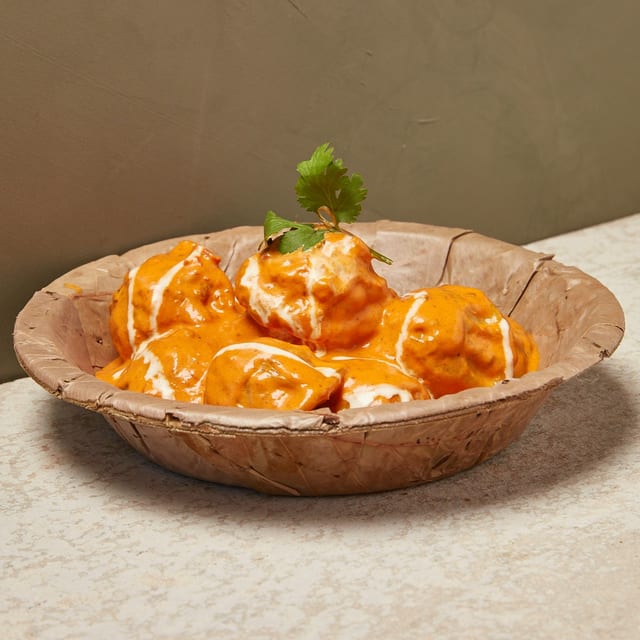 BUTTER MASALA MOMO.